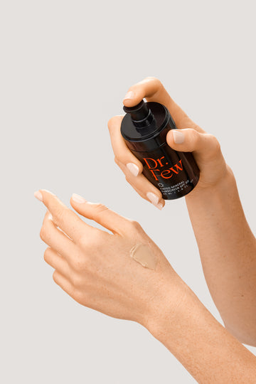 Dr. Few Skincare Tinted Mineral Sunscreen dispensing onto hand