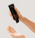 Dr. Few Skincare exfoliating gentle cleanser dispensing in hand