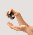 Dr. Few Skincare Supreme Oil Serum dispensing onto hand
